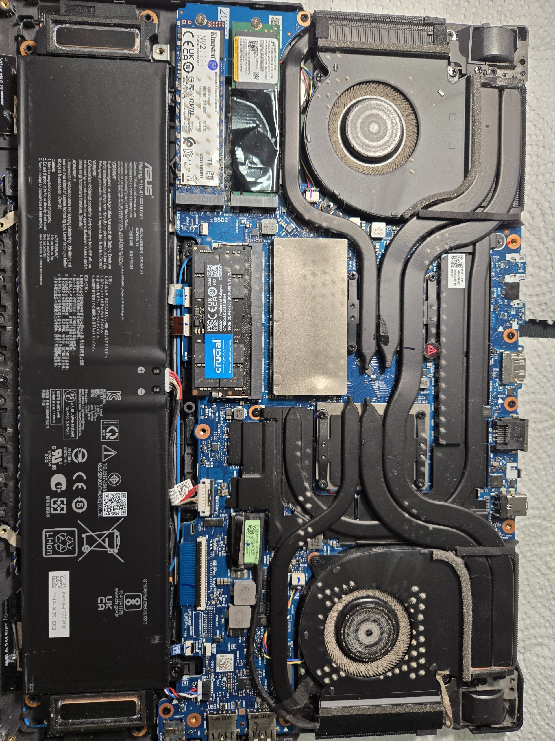 An open desktop PC being inspected and rebuilt